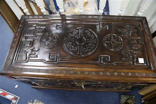 A Chinese hongmu archaistic chilong and medallion chest, c.1900, H. 63.5cm x W. 106cm x D. 54cm